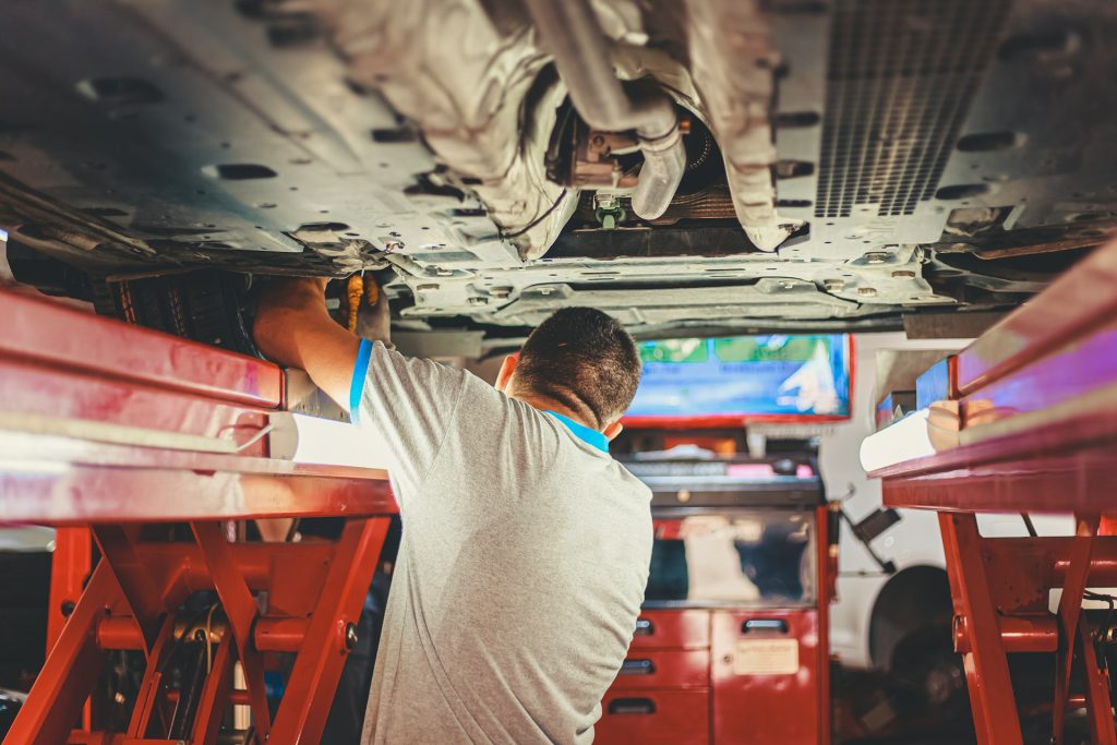 Mechanic working on a car